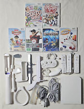 Console Wii + 6 giochi + 3-4 controller + pacchetto Nunchuck + Family Party
