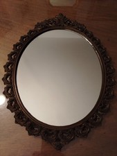 Specchio antico,ovale,cornice in metallo traforato