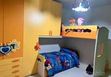 cameretta bimbi a ponte..arancio e beige..condizioni buone 