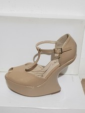 Zeppe scultura beige vernice