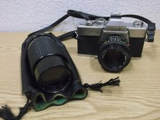 Fotocamera Minolta SRT 200 anni 70 con obiettivo più obiettivo Super Paragon con custodia