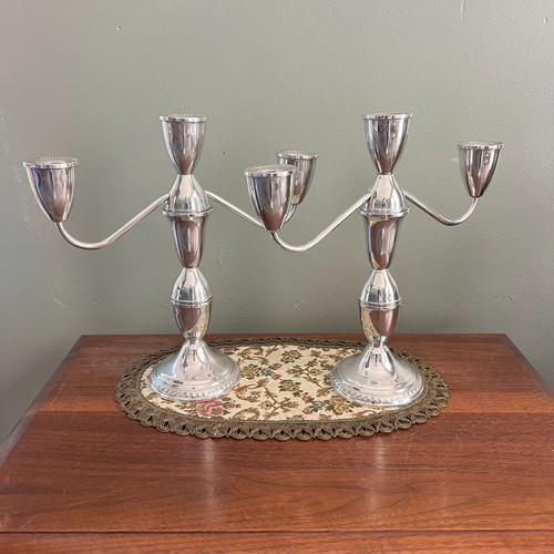 Coppia candelabri tre luci - tre,