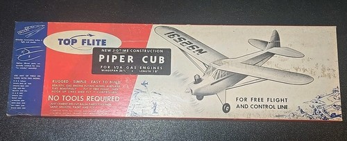 Top flight piper - cub, flying
