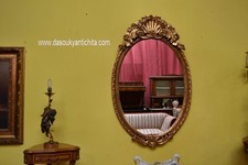 Specchiera ovale dorata stile