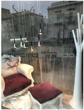 Poltrona bianca Modà modern con poggiapiedi