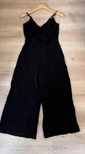 Tuta cropped gamba larga nera