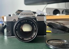 Camara Olympus OM20 + Objetivo