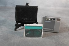 Minolta Dimage Xt | fotocamera digitale | argento più pellicola sigillata