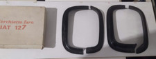 COPPIA CERCHIETTI CORNICI FARO ANTERIORE IN PLASTICA ACCESSORIO FIAT 127