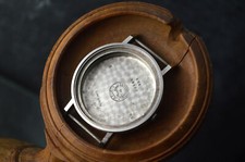 LONGINES STAINLESS STEEL COIN