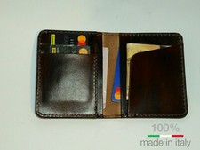 Porta carte di credito in puro cuoio. Molto comodo con portatessera verticale