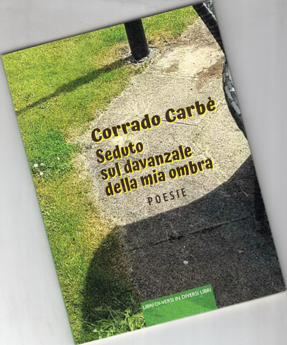 Corrado carbè seduto sul - seduto,