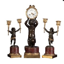 Trittico in Bronzo con Orologio e Coppia di Candelabri Francia 800 Putti Bronzo