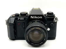Nikon F-301 + Vivitar 75-205