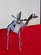 Scultura in metallo inciso