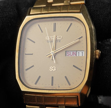 Seiko SQ orologio vestito tono oro quadrato 8123-5129 data giorno 30M 32mm x 38mm vintage