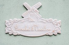 Wooden bas-relief. windmill