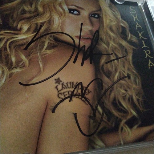 Signed shakira laundry - signed,