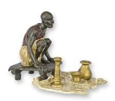 Scultura in bronzo uomo con