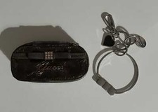 Set originale Guess con portamonete grigio con specchietto interno e portachiavi