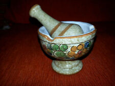 Mortaio e pestino in ceramica