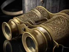 Antico binocolo in ottone con