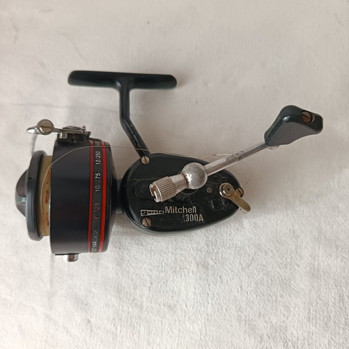 Moulinet peche mitchell - de,