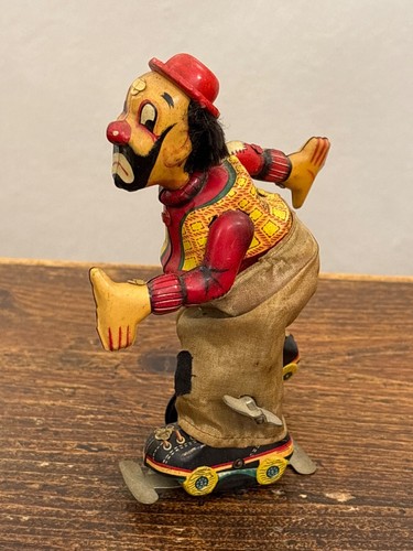 Clown pattini giocattolo a - clown,