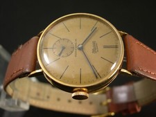 * * EBERHARD  IN ORO A 18 K