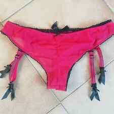 Slip Brasiliano INTIMISSIMI giarrettiera rosso con profili neri e disegni oro