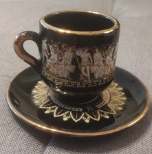 BLACK CERAMIC MUG AND SAUCER