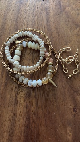 Set bracciali con pietre toni