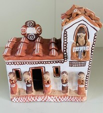 Casa in terracotta. Oggetto