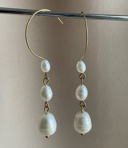 Orecchini pendenti con perle