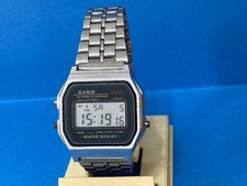 CASIO ALARM CHRONO WR LITHIUM 593 A159W QUARTZ QUADRANTE SCURO MADE IN JAPAN.