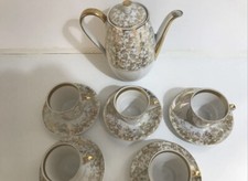 ⸻SERVIZIO CAFFÈ IN PORCELLANA ANTICA – MOTIVI FLOREALI E DECORI DORATI