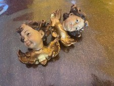 Vintage coppia teste d`angelo