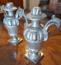 Antiche portapalme in legno tornito, intagliato con finitura argentata a mecca