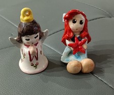 Coppia statuine in ceramica di