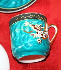 SERVIZIO CAFFE' IN PORCELLANA DIPINTO A MANO CON FIGURE IN RILIEVO MADE IN JAPAN