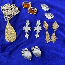 Lotto orecchini clip collana