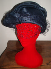 Cappellino da sera in seta blu notte con veletta