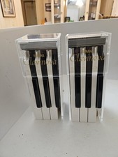 Fermalibri/espositori Tasti