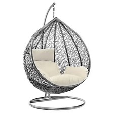Sedia a dondolo in rattan con