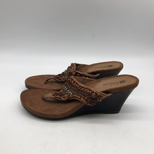 Sandali con zeppa e perizoma