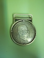 Fermasoldi, molletta in argento ricavata in una moneta da L.5