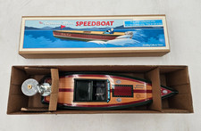 Motoscafo fuoribordo in latta