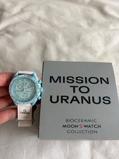 Swatch omega mission - omega,