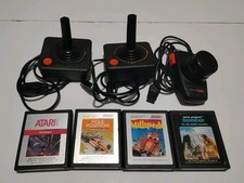 Lotto: 2 Joystick Atari - 1 Paddle e 4 Giochi per Atari 2600 VCS PAL 