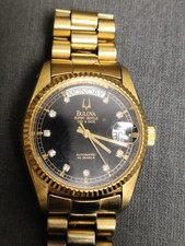 bulova super seville day date